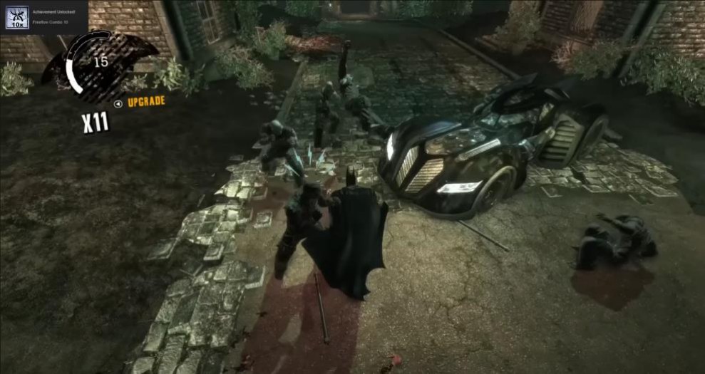 A fight against several enemies seen from a high, distant camera